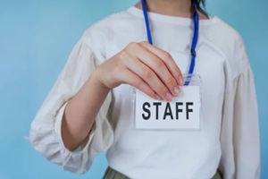 person who shows the staff card. Staff, office workers, staff, recruitment, temporary staffing